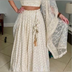 Like New! Only Worn Once 

Ivory/beige with gold accents lehenga Size: X-Small.